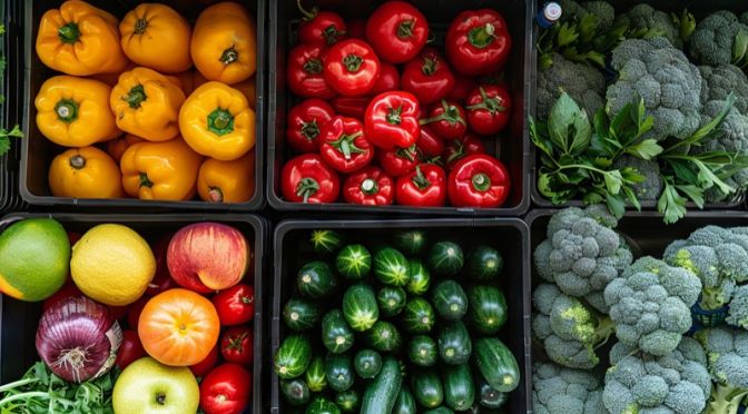 Open refrigerator stocked with vibrant produce